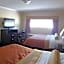 Metropolitan Inn & Suites