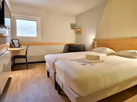 Triple Room with Two Single Beds and Sofa Bed