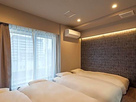 Quadruple Room with Private Bathroom