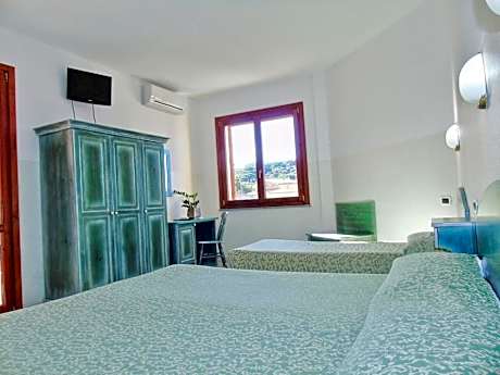 Quadruple Room with Balcony