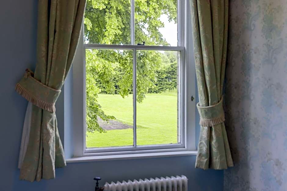 Woodland Manor Hotel