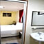Capital O 90897 Island City Hotel