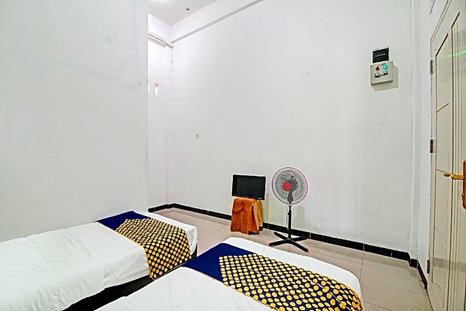 Hotel O Penginapan Puti SyariahNearBandara Sultan Syarif Kasim II