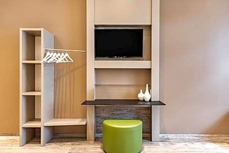 Premium Family Room with Two Queen Beds and Single Sofa Bed