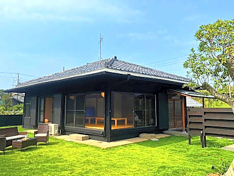 A villa with large garden and bunk beds for kids.