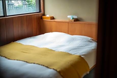 Queen Room with Shared Bathroom