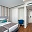 Essence Inn Marianos Hotel