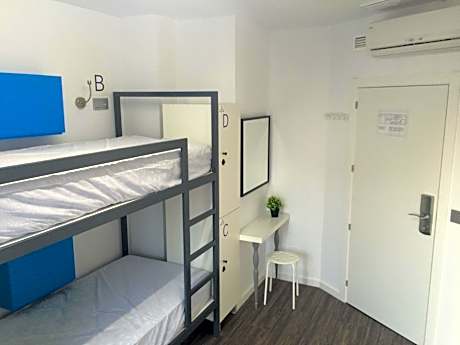 Bed in 4-Bed Female Dormitory Room with External Bathroom