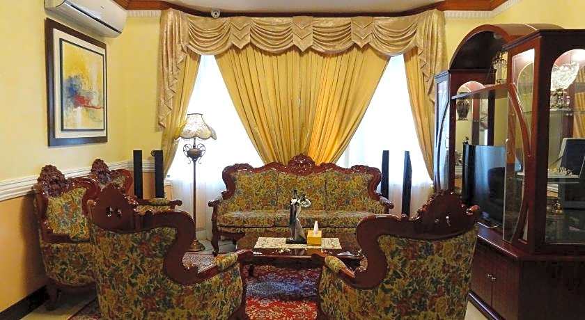 The Executive Villa Inn & Suites