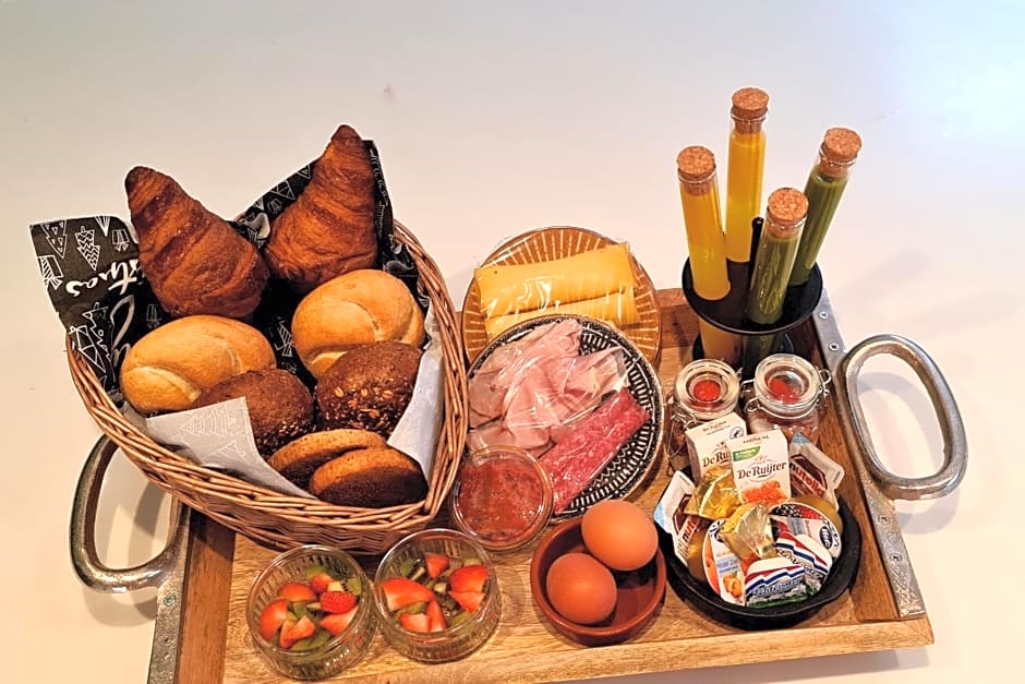 B&B het duinhuisje met jacuzzi, gratis parkeren, 2 fietsen te leen, airco