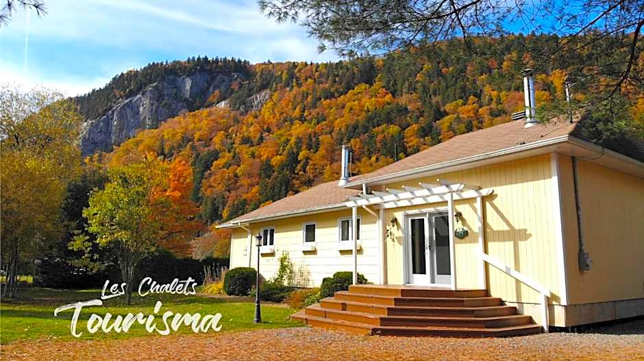 Tranquil Riverfront Chalet with Hot Tub