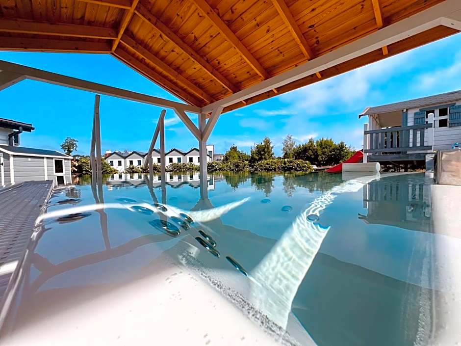 Biale Domki Paula Rewal - Domki z klimatyzacja, w obiekcie Jacuzzi i darmowe Wifi!