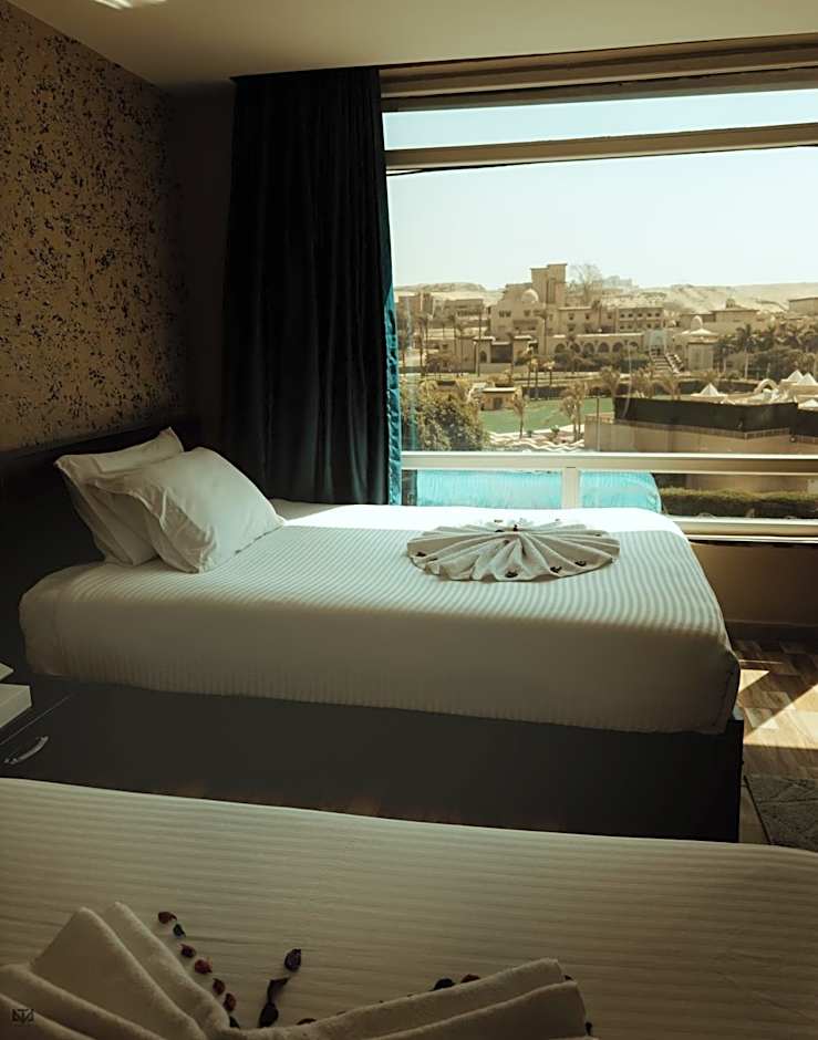 Turquoise Pyramids & Grand Egyptian museum view Hotel