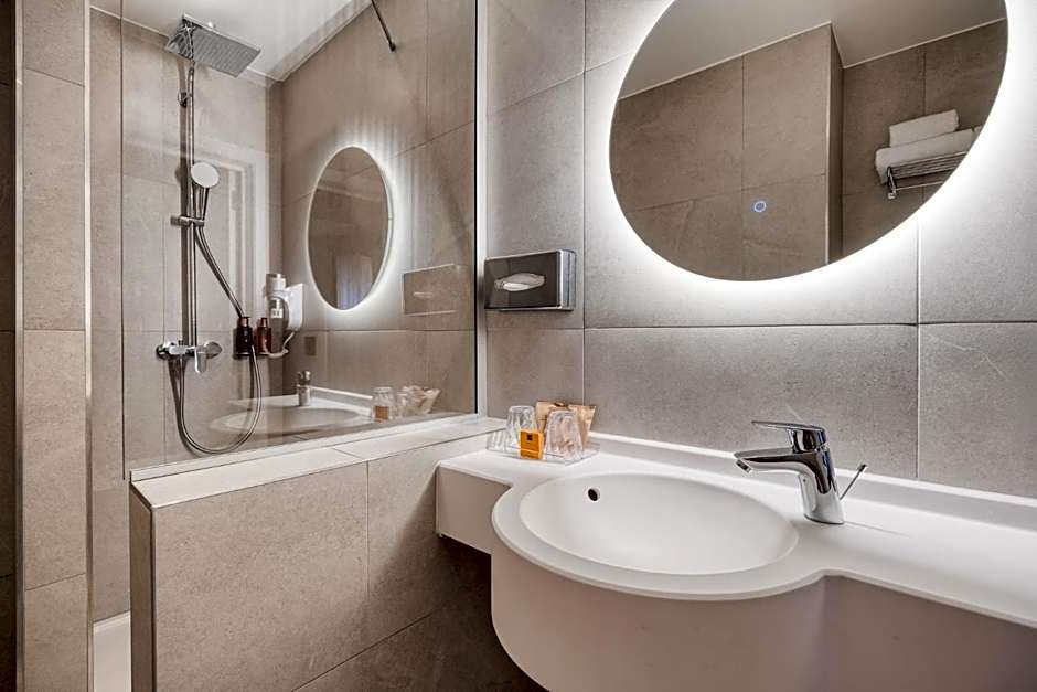 Alma Grand Place Hotel