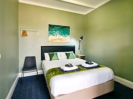 Queen Room with Shared Bathroom