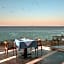 Cavo Orient Beach Hotel & Suites