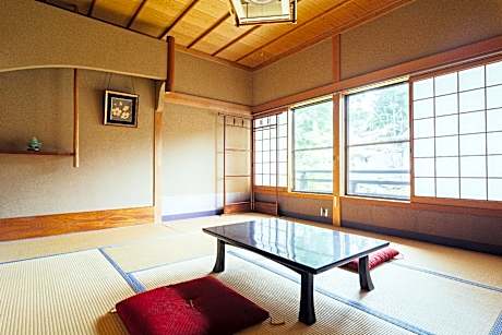 Japanese Style Family Room With Shared Bath
