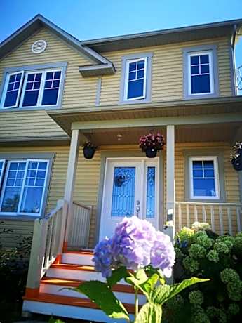 Maison chaleureuse, énergétique et florale