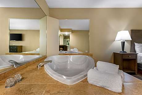 Suite-1 King Bed, Non-Smoking, Heartshaped Jetted Tub, Microwave And Refrigerator, High Speed Intern