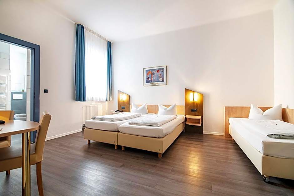 Photo 1 of 3 of Triple Room