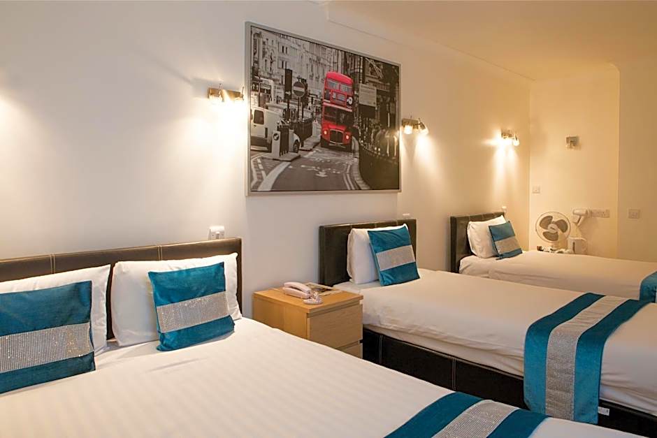 Photo 1 of 12 of Quadruple Room