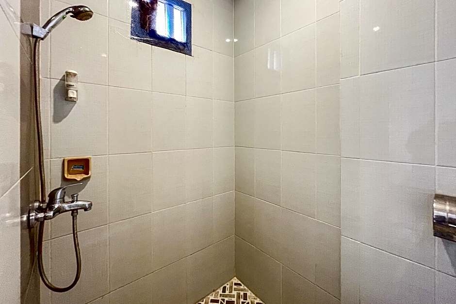 Urbanview Poma Hotel