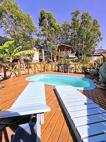 Pousada Rosa Shanti, café da manhã opcional, apenas 4 cabanas, piscina, estacionamento privativo, área de festas com churrasqueira e cervejeira, cantinho da fogueira, localizado junto a natureza