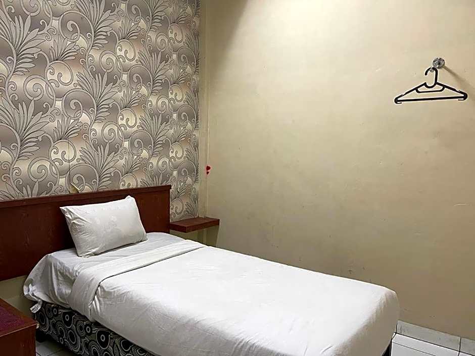 Capital O 93285 Residence Hotel Syariah