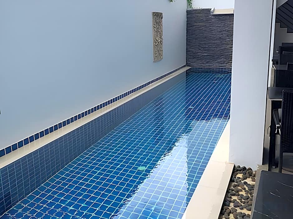 One World One Home Naiharn Hotel