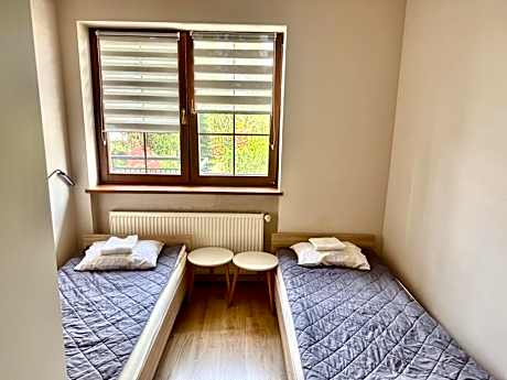 Bed in 3-Bed Dormitory Room with Shared Bathroom