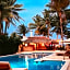 Petit Lafitte Beach Front Hotel & Bungalows