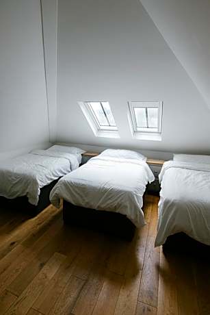 Single Bed in Dormitory Room