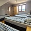 Wrzosowe Wzgórze 5 - Studia i Apartamenty