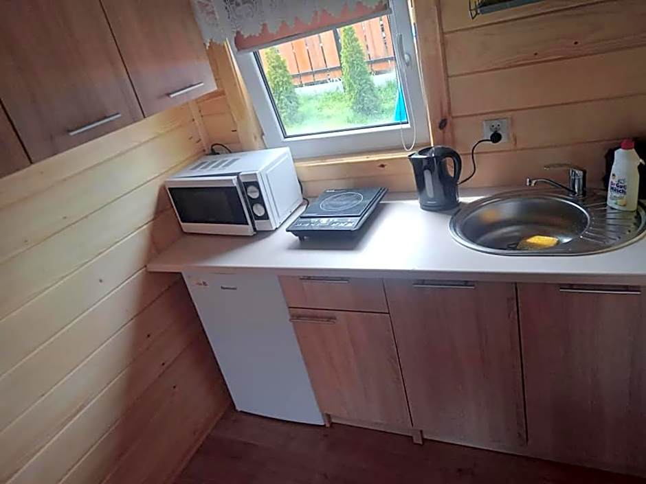 Domki i pokoje ,,Pod Palmami" w centrum