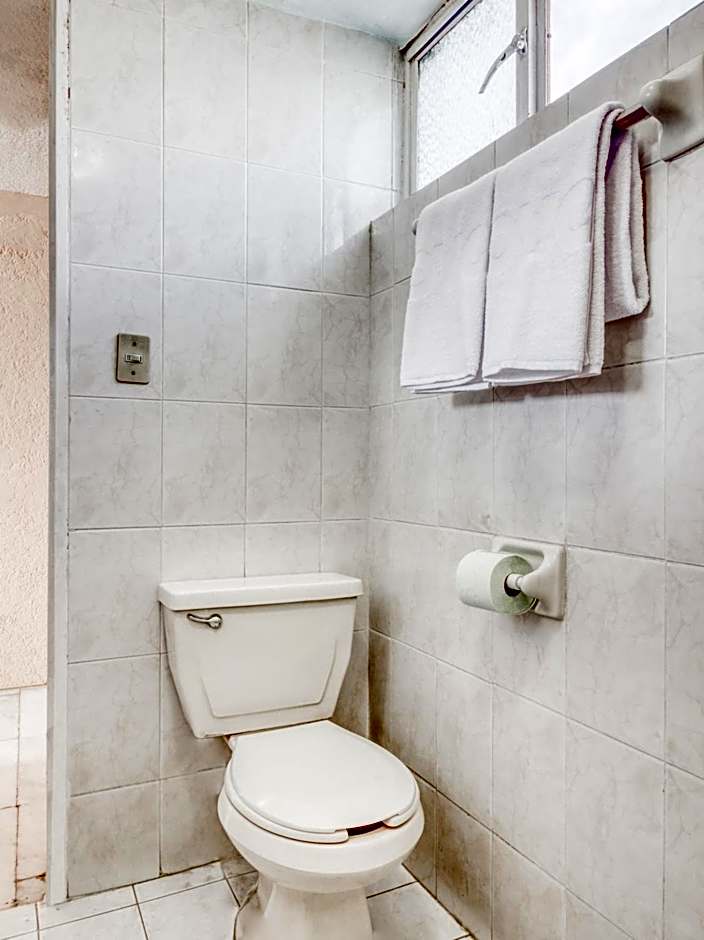 Capital O Hotel La Siesta