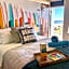 Luxury Beachfront Studio - Private Balcony with Ocean View - Heated Pool - Hot Tub - Tiki Bar - Sauna