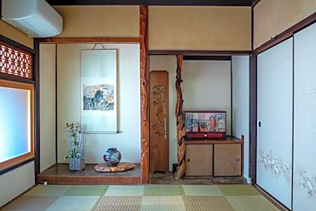 Japanese-Style Family Room with Shared Bathroom