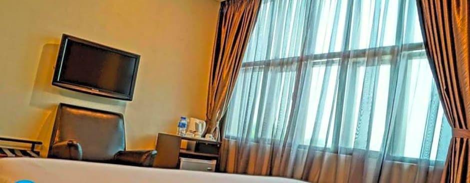 Capital O Rail Hotel