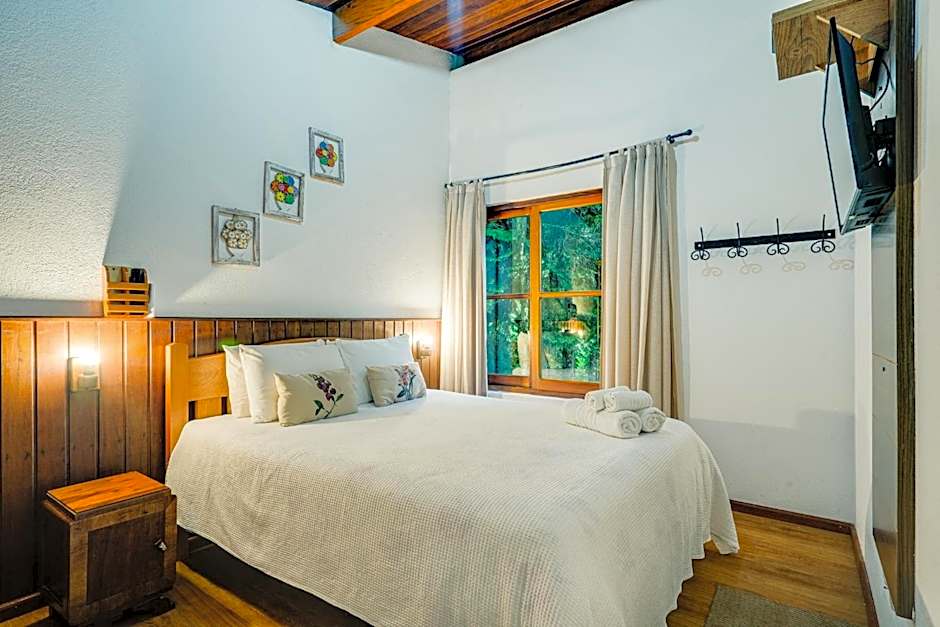 Photo 1 of 26 of Quarto Quadruplo Confort