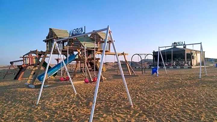 لاسرينا عيون موسي راس سدر أرضي بجاردن فيو بحر وعلي البيسين للعائلات فقط