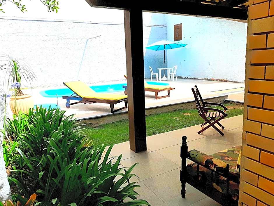 Casa ÍSIS de aluguel por temporada em Capão da Canoa com piscina