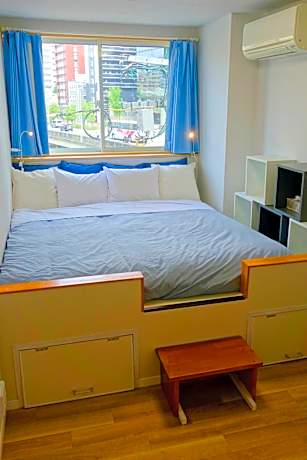 Queen Room with Shared Bathroom