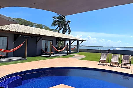 Casa Ilha| beira mar, piscina aquecida, 4 suítes