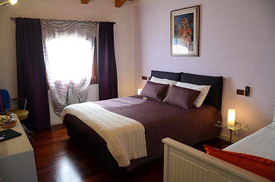 Photo 1 of 8 of Quadruple Room with Private Bathroom