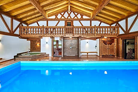 Aktivhotel & Gasthof Schmelz Ihr familienfreundliches Urlaubs Hotel in Inzell mit Wellness Hallenbad, Alpensauna & Dampfbad