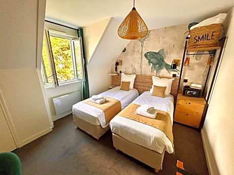 Attic Twin Room with Courtyard View