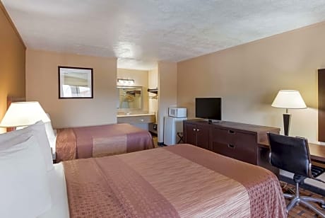2 Double Beds, Non-Smoking, Flat Screen Television, Work Desk, Lounge Chair, Microwave And Refrigerator, High Speed Internet Access, Continental Breakfast