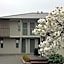 TOWER JUNCTION MOTOR LODGE- Motel with Airport and Railway Station Transport Service