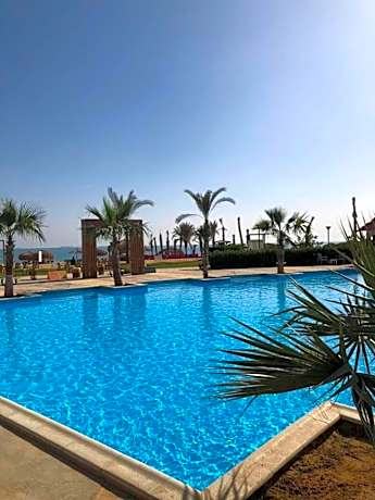 Laserina Palm Beach for families only with ground floor with big garden there is entrance extra fees 250 LE per adult