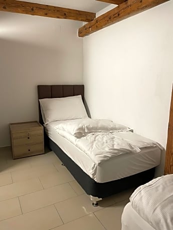Single Bed in Female Dormitory Room